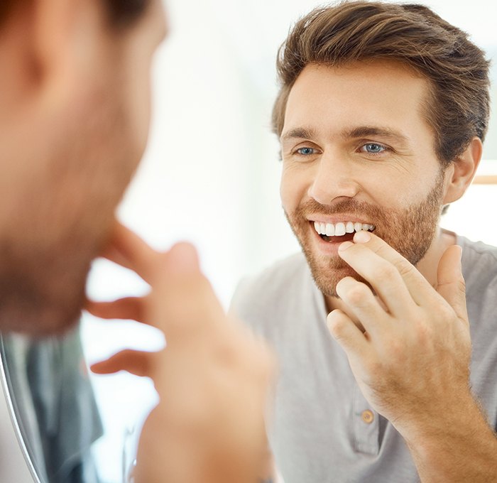 Patient in Marysville smiling with a custom dental bridge 