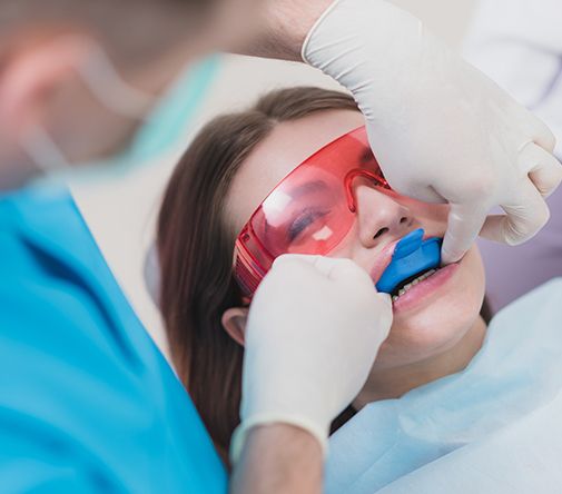 woman getting fluoride treatment