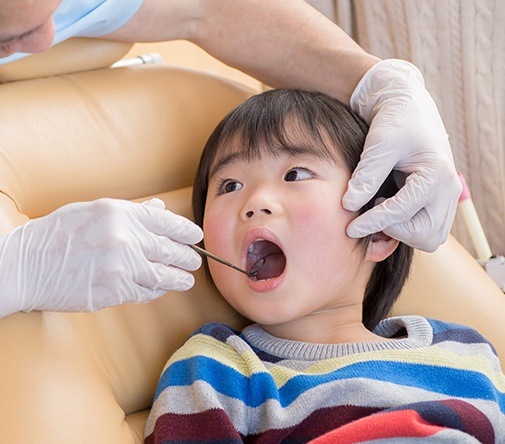 young boy getting checkup