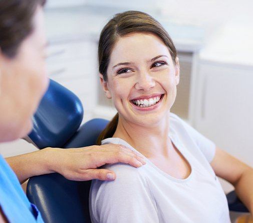 woman smiling at dentist