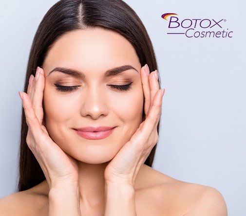 woman framing face with hands with botox logo