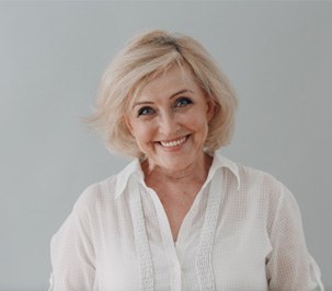 Woman smiling with dentures