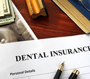 Dental insurance paperwork on a table