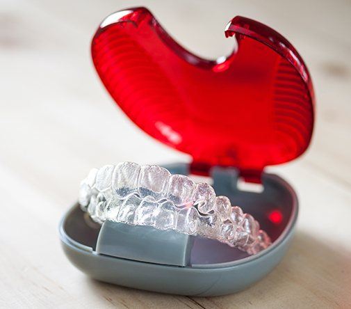 invisalign in red and grey case