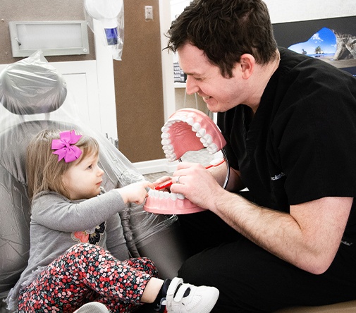 Dr. Budendorf working with young female patient