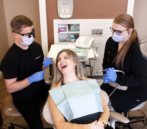 Dr. Cleveland working with female patient