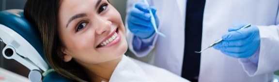 woman smiling over shoulder at camera