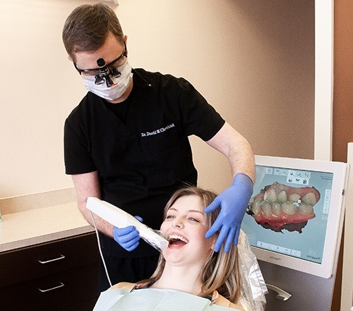 dentist using digital impression system