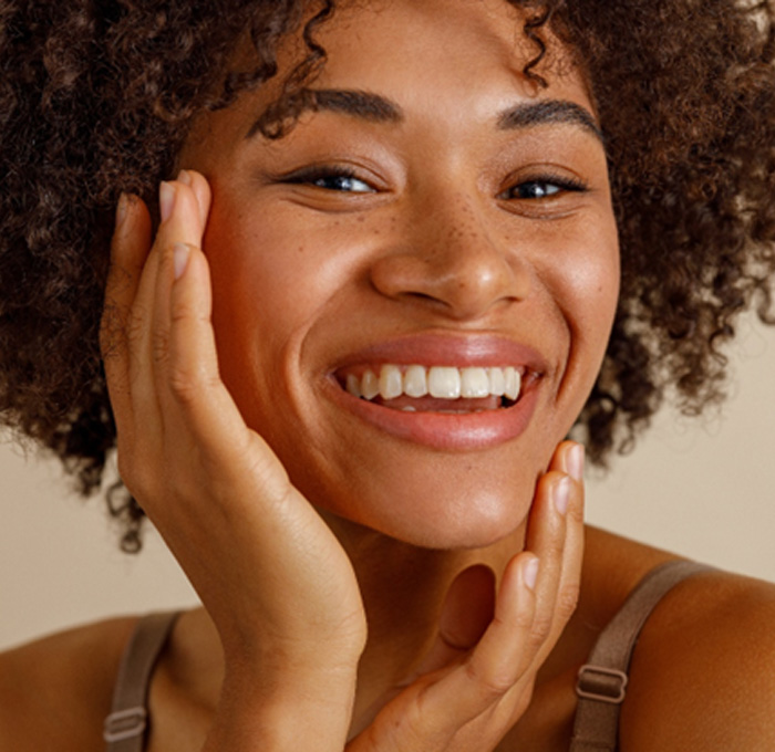 Closeup of woman with white teeth smiling