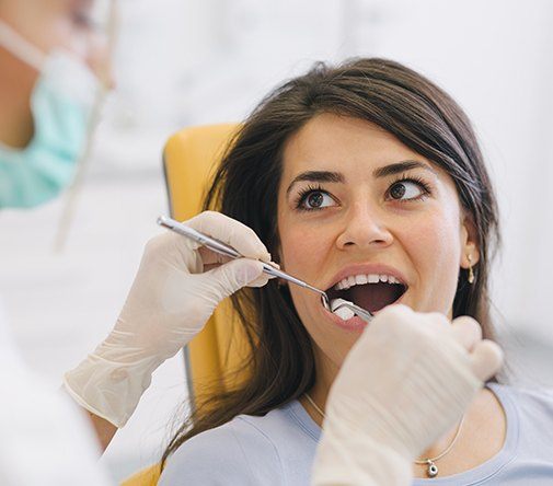 woman after tooth was extracted