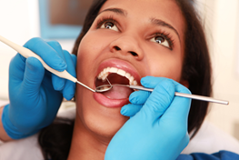 woman receiving dental exam