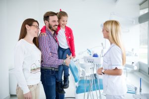 Family visiting dentist