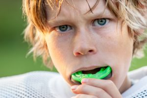 kid with mouthguard