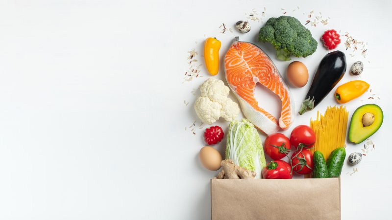 paper bag full of healthy foods