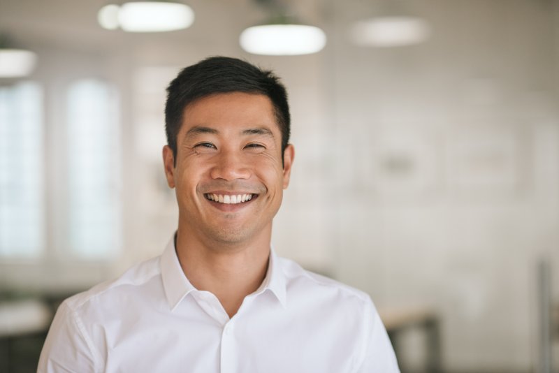 person with nice smile thanks to cosmetic dentistry
