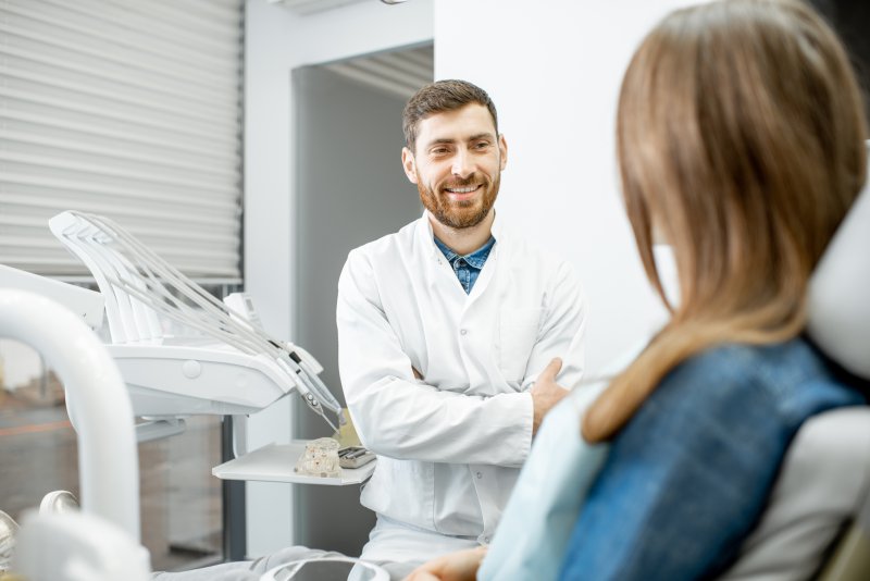 dentist talking to patient about gum disease
