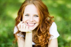 Smiling woman enjoying spring