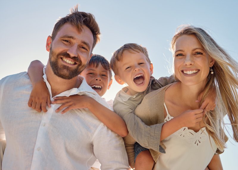 Smiling family on a beach