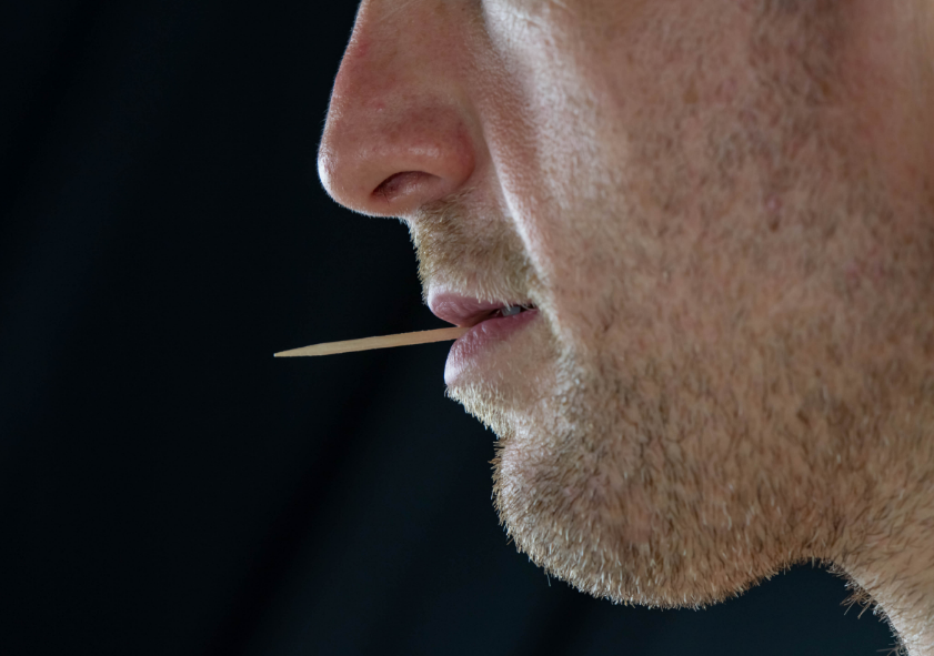Man with toothpick