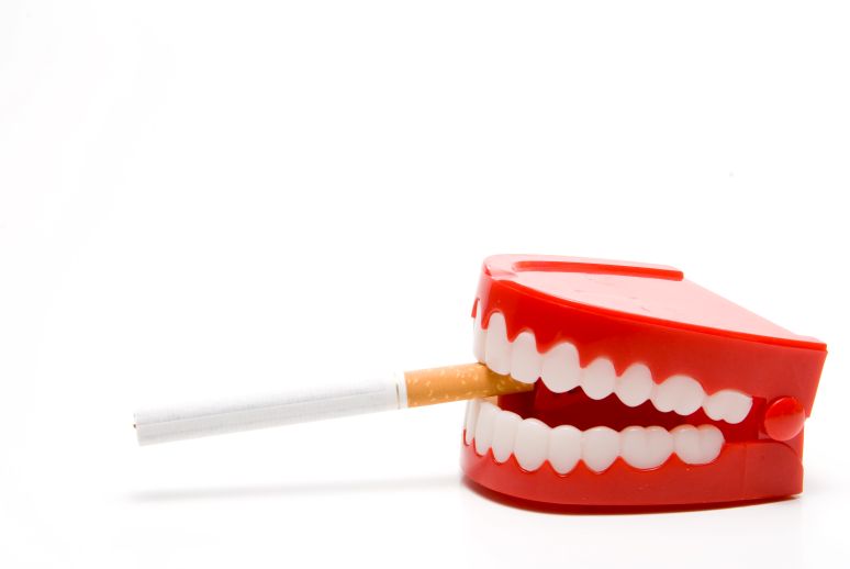 Dentures with cigarettes